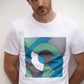 white cotton t-shirt with square print in geometric shapes of green, blue and grey